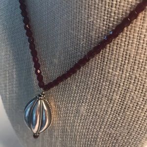 Artisan ruby beaded necklace with sterling bauble